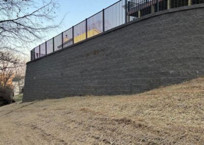 Retaining wall supporting a terraced yard on a steep slope in St. Louis home